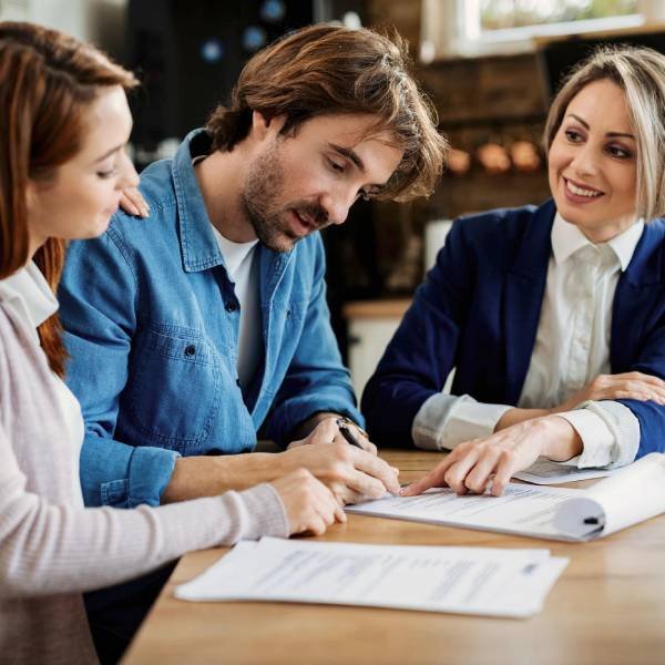 Female lawyer with clients