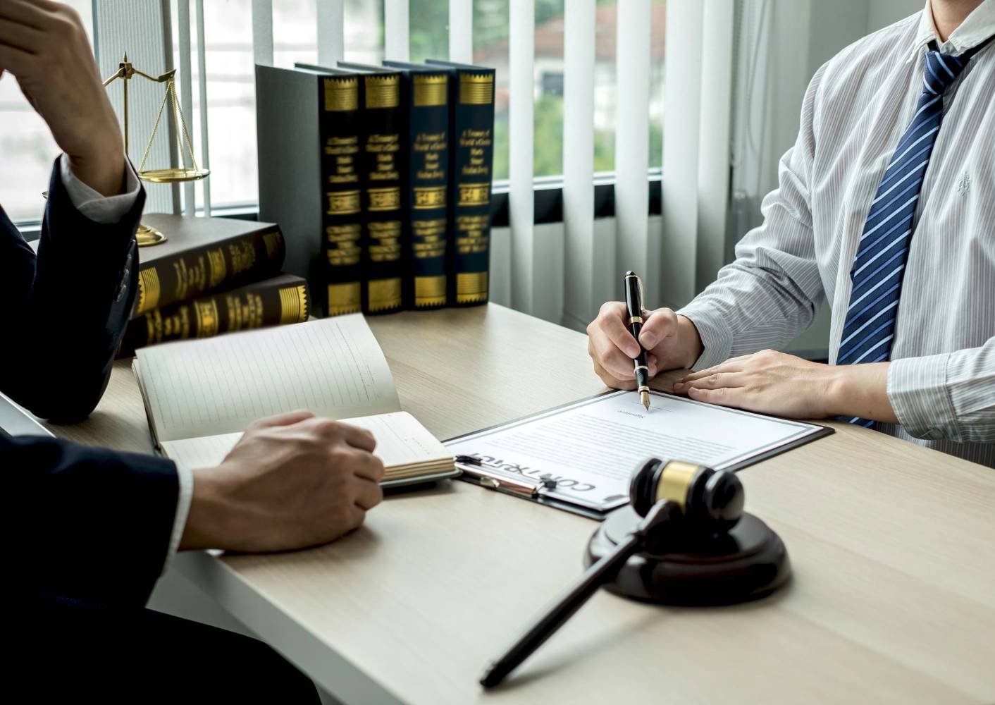 two man sitting in a table